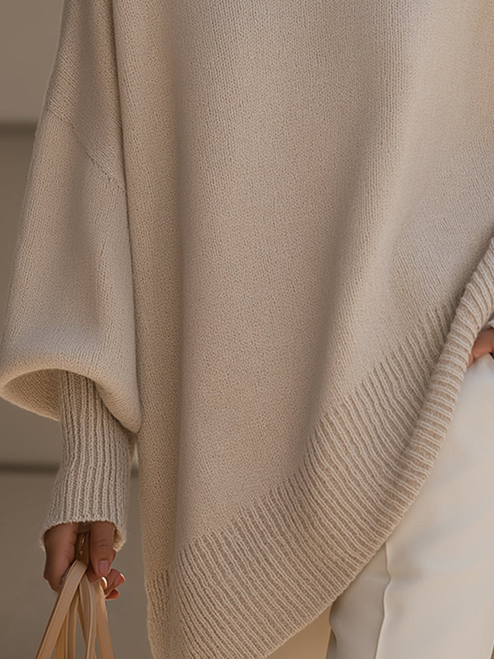 A woman wearing a soft crew neck jumper with jeans for a warm, easy everyday look.