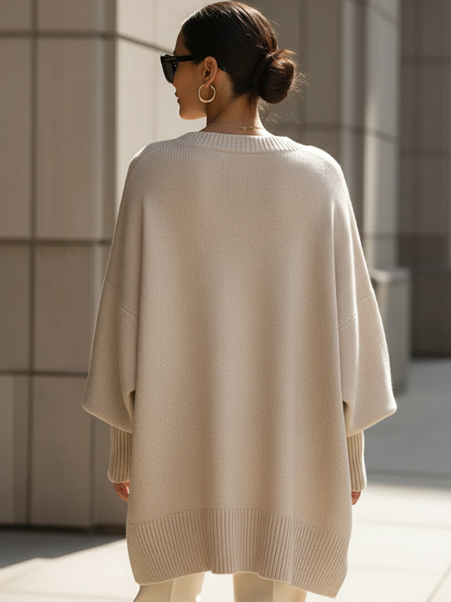 A woman wearing a soft crew neck jumper with jeans for a warm, easy everyday look.