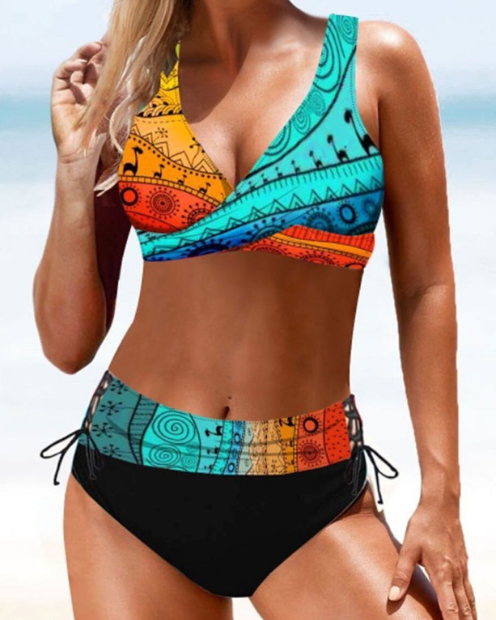 Fuchsia and multicolour crossover bikini with a V-neckline top and colourful bottoms