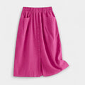 High-waist vintage-style midi skirt in dusty rose with functional front pockets
