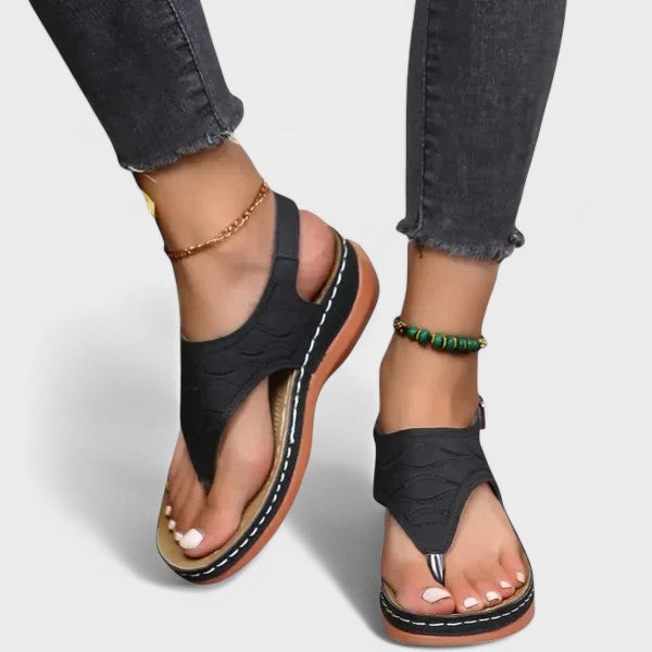 Women's ankle-strap comfort sandals in black with a cushioned anatomic footbed