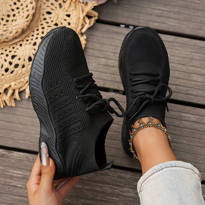 A woman wearing ultra-light comfort trainers on a long walk