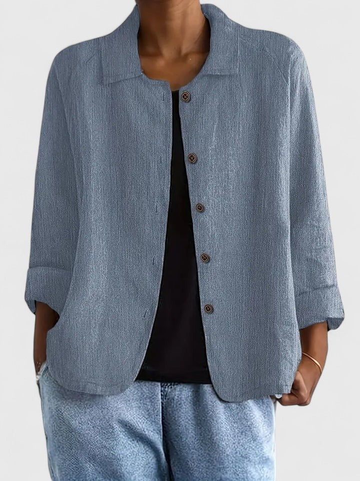 Women's lightweight button jacket in soft dusty blue with a relaxed, open silhouette