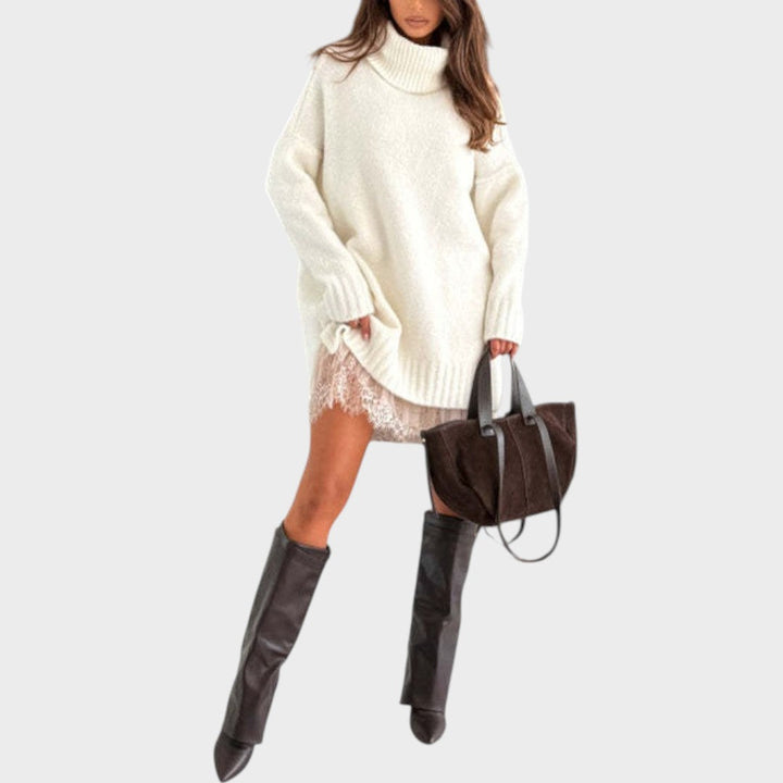 A warm roll-neck jumper and floaty openwork-hemmed dress two-piece set in brown tones