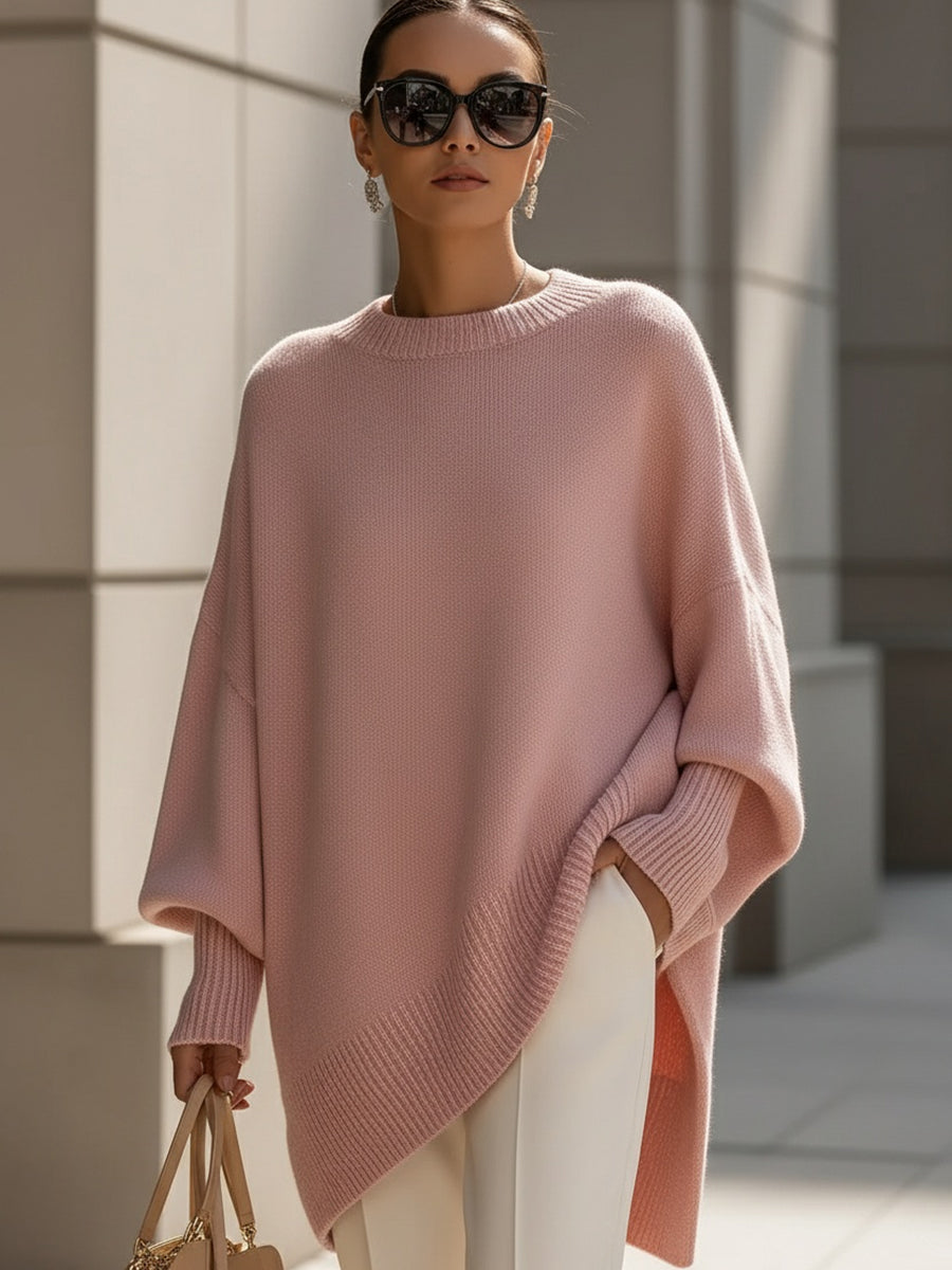 A woman wearing a soft crew neck jumper with jeans for a warm, easy everyday look.