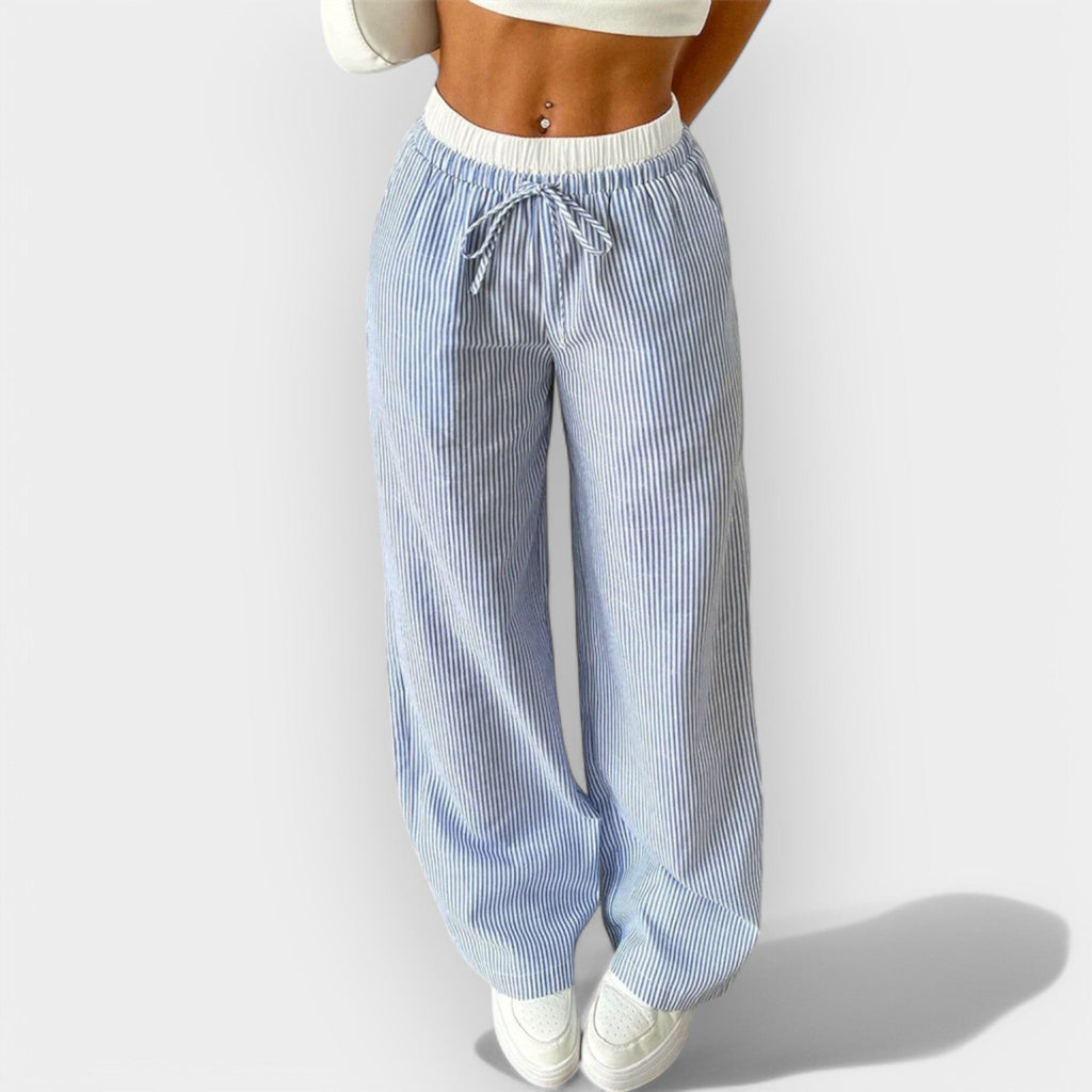 Women's wide-leg trousers in blue with fine vertical stripes and an ultra-wide waistband