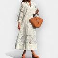 Oversized floaty white dress with a relaxed free-falling silhouette