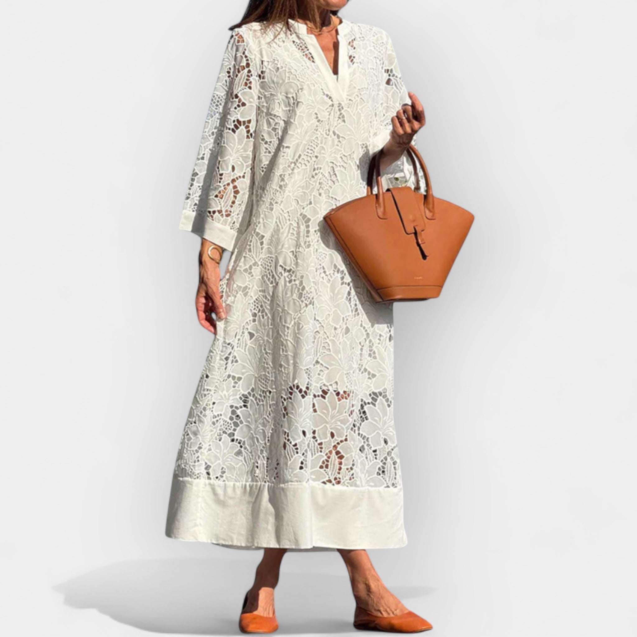 Oversized floaty white dress with a relaxed free-falling silhouette