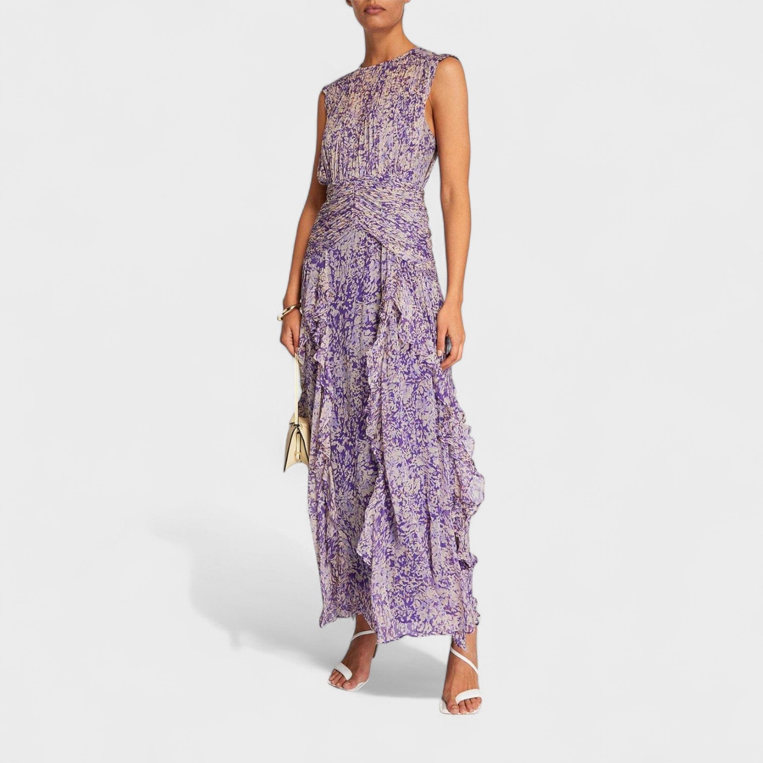 A purple floral fluid midi dress with a gently fitted bodice and flowing skirt