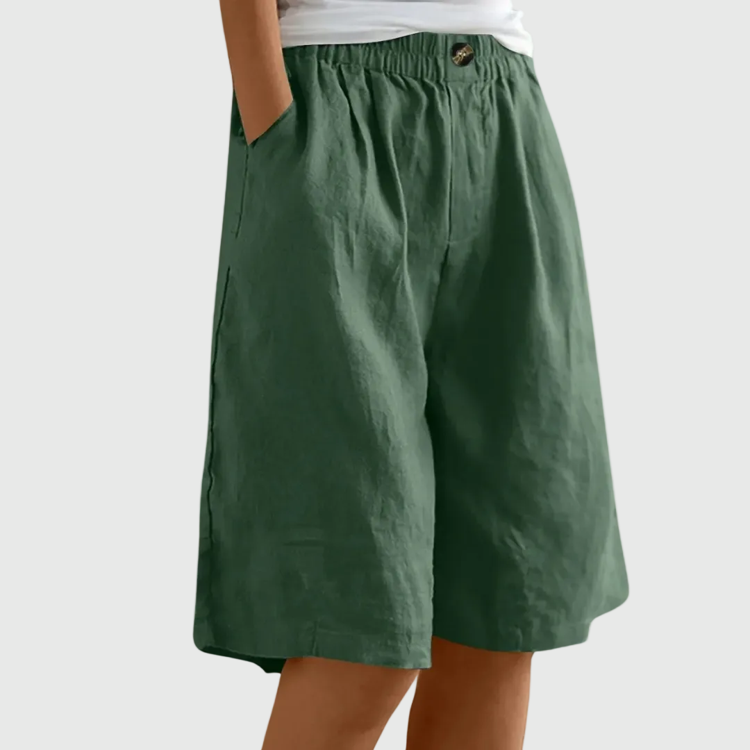 Women's casual leisure shorts in soft pink with an elasticated waist and relaxed fit