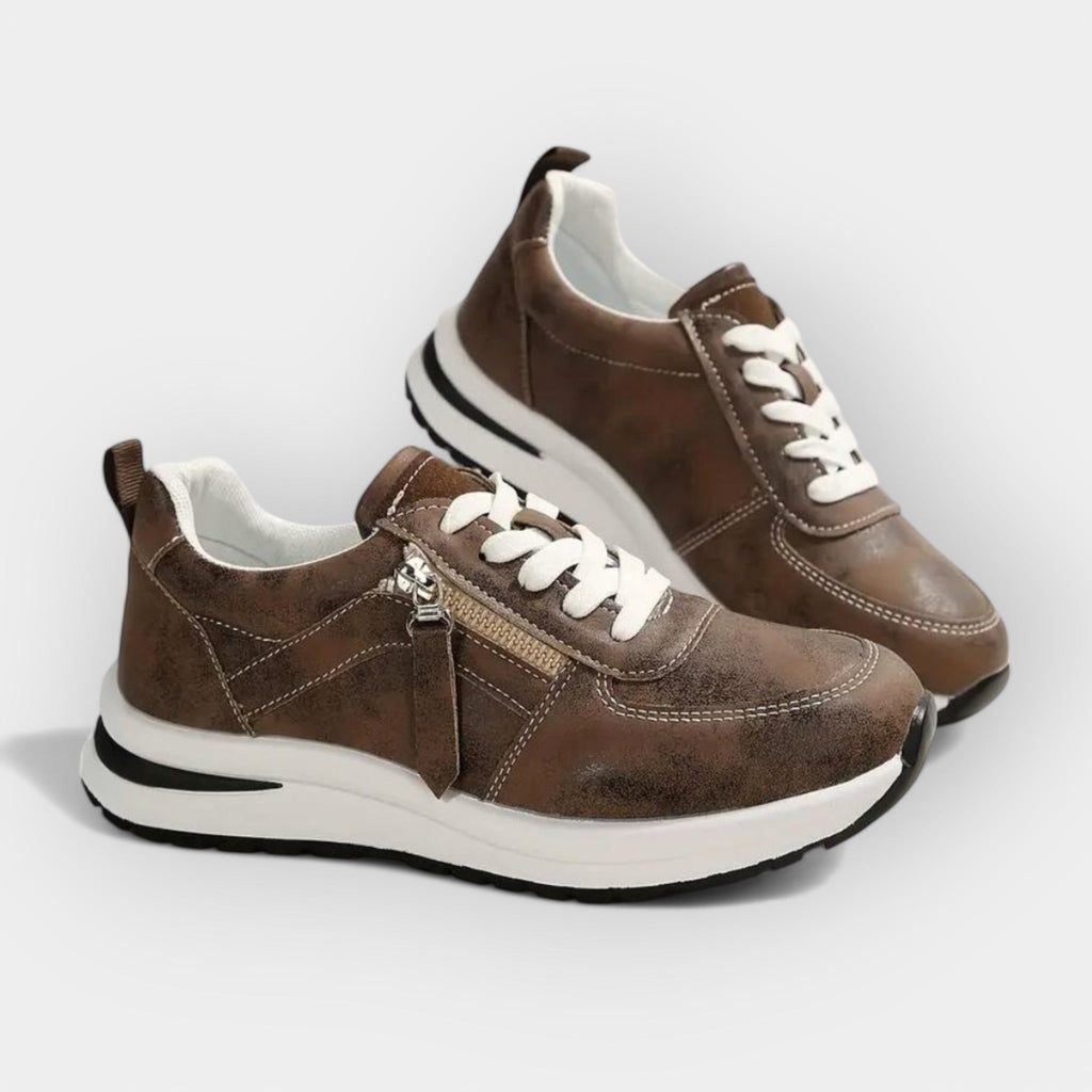 Women's elegant anatomic trainers in black with a supportive cushioned sole