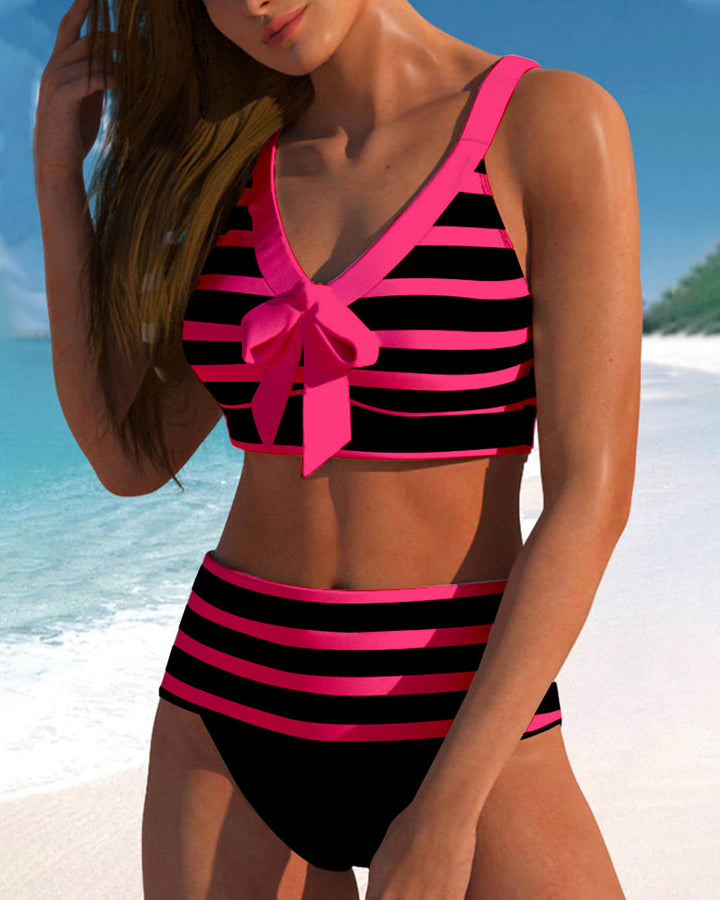Black and white striped high-waist bikini with a knotted front detail on the top