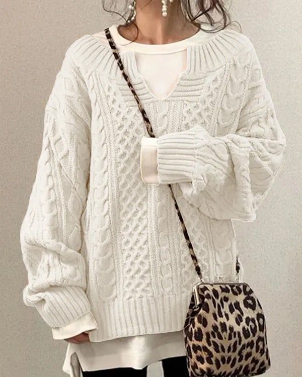 Beige cable knit v-neck jumper with classic textured pattern and relaxed fit