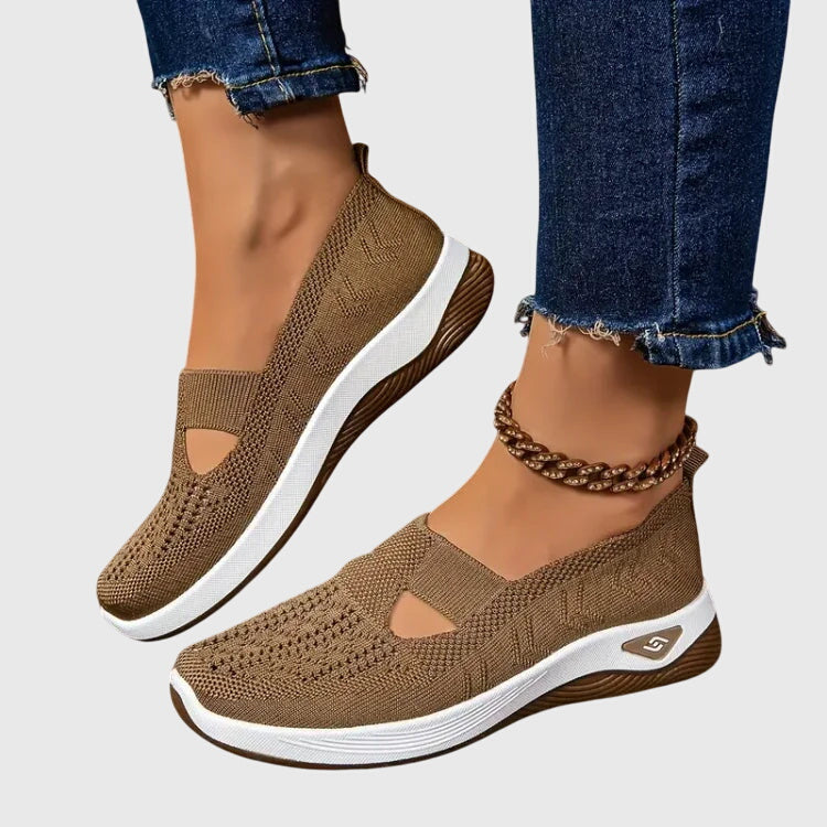 A woman out for a long walk in supportive orthopaedic walking shoes.
