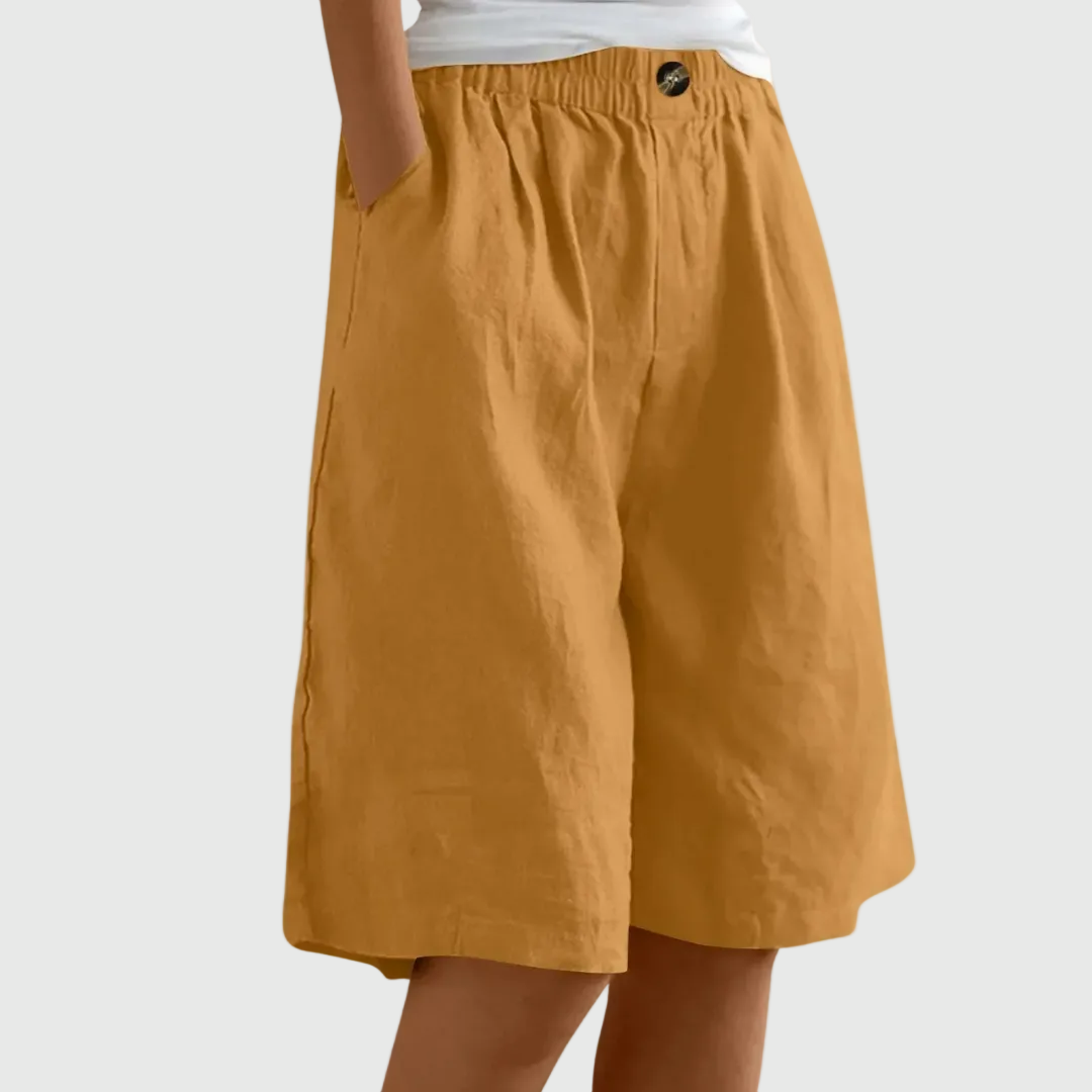 Women's casual leisure shorts in soft pink with an elasticated waist and relaxed fit