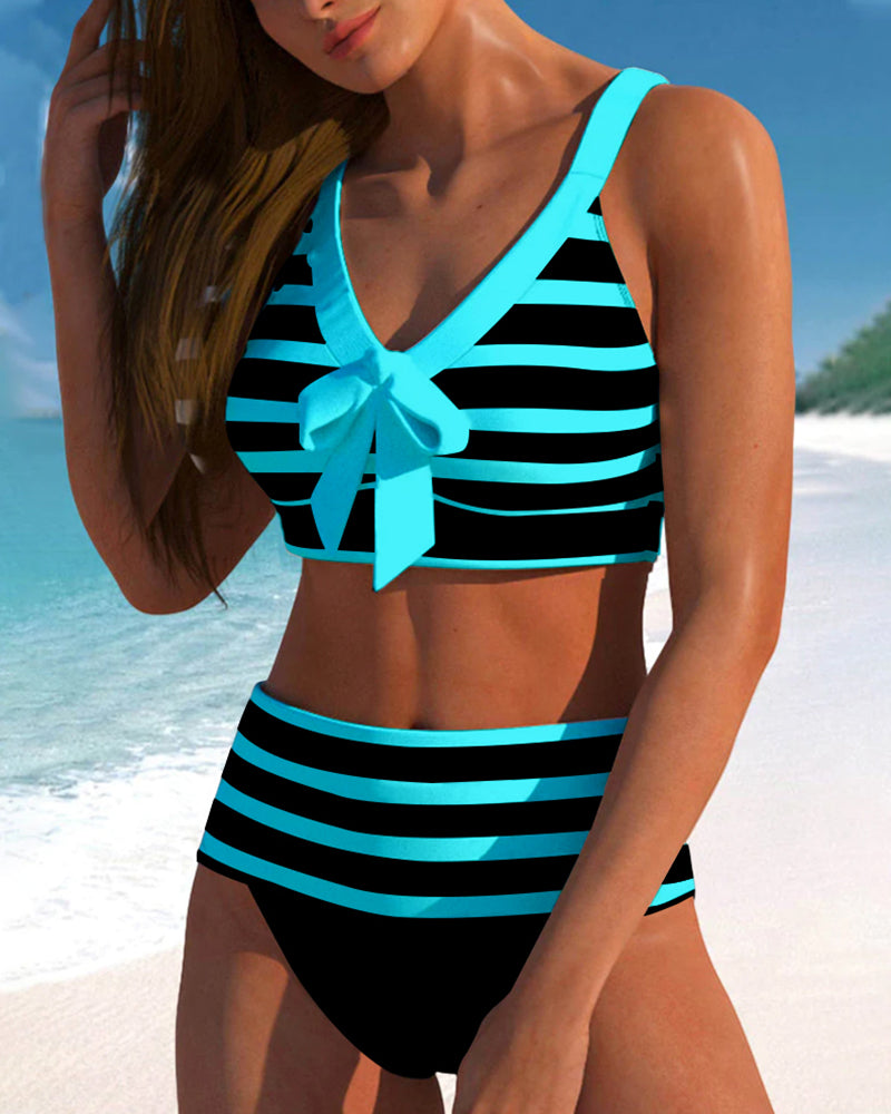 Black and white striped high-waist bikini with a knotted front detail on the top