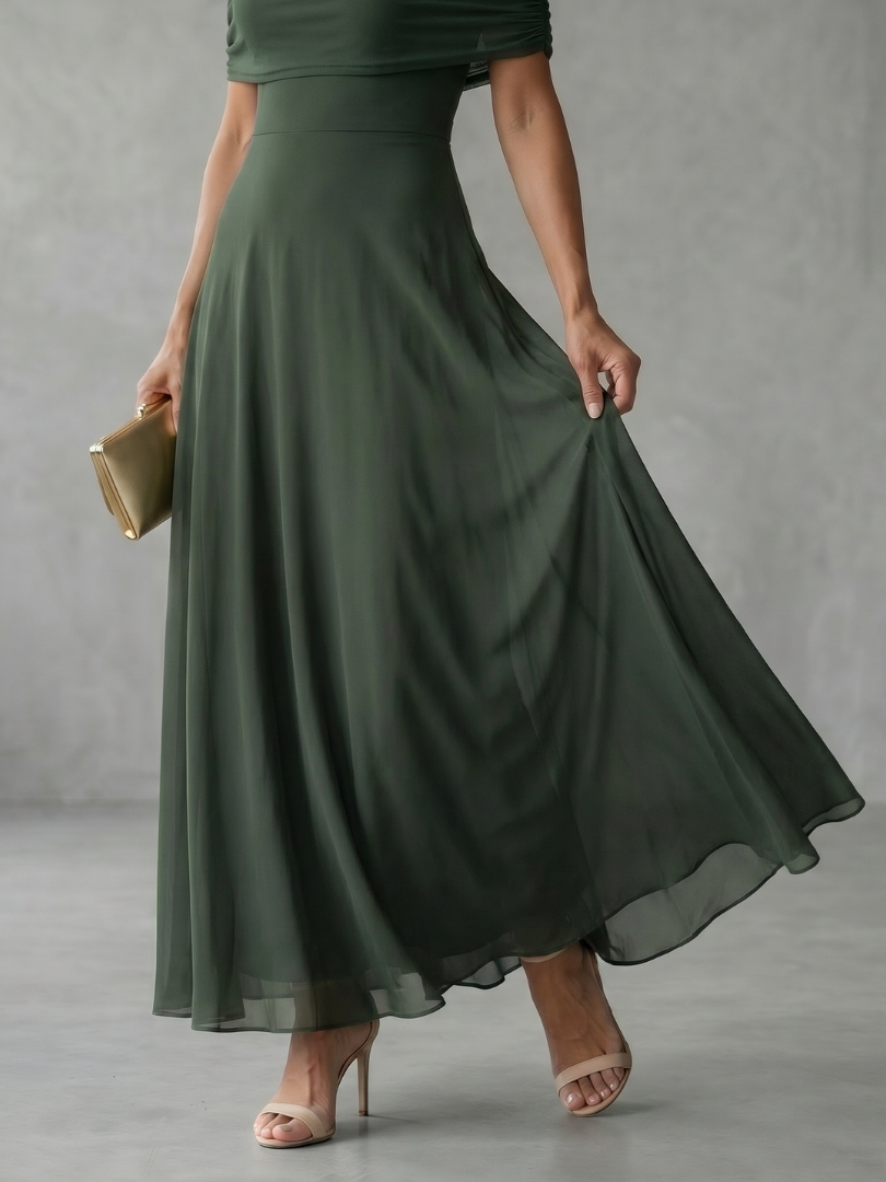 Brown midi dress with off-shoulder draped neckline and sheer outer layer over smooth lining