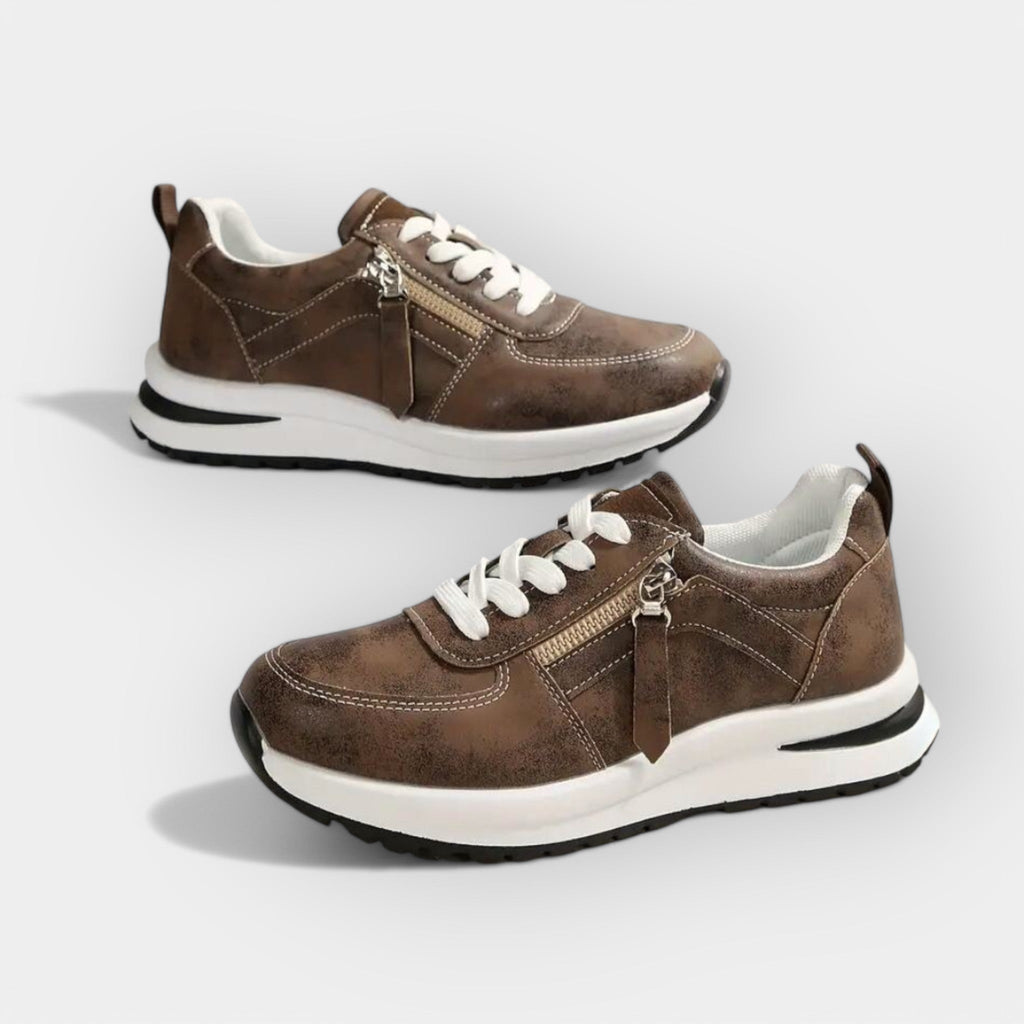 Women's elegant anatomic trainers in black with a supportive cushioned sole
