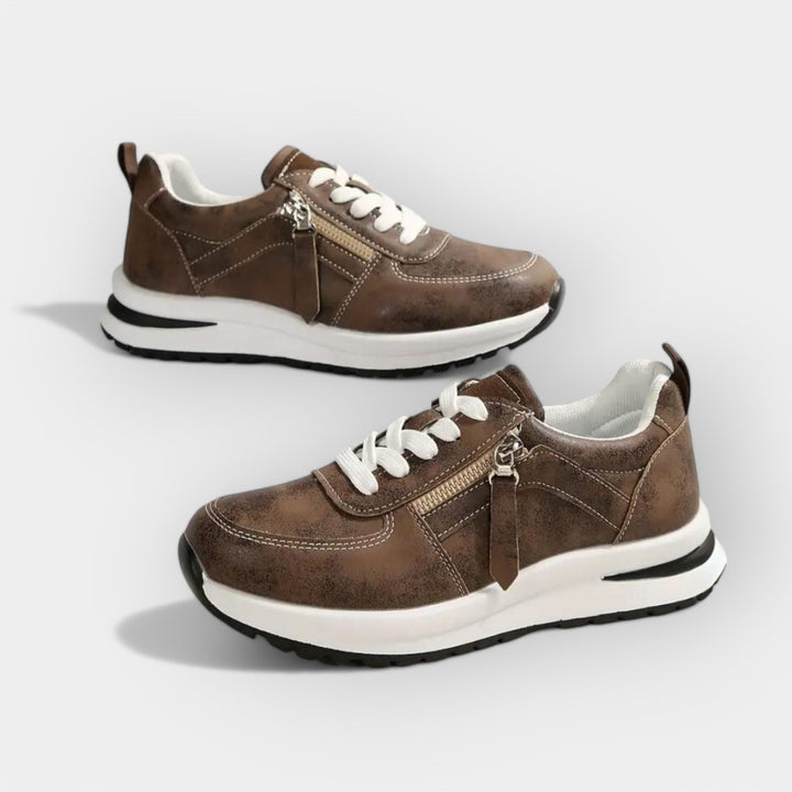 Women's elegant anatomic trainers in black with a supportive cushioned sole