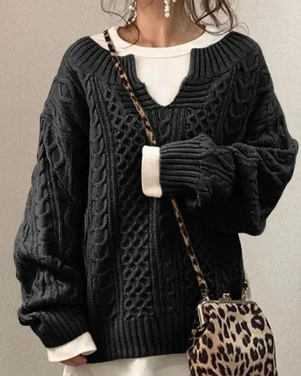 Beige cable knit v-neck jumper with classic textured pattern and relaxed fit