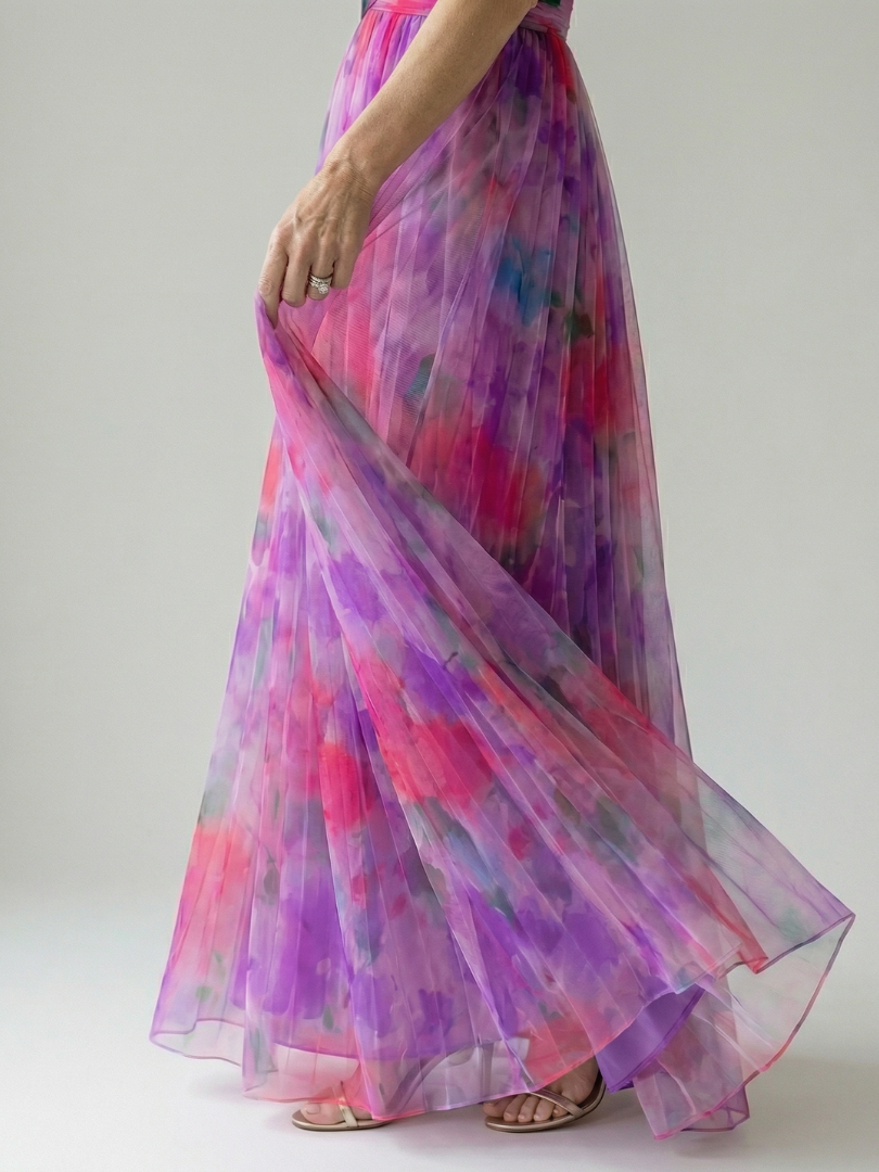 Multicolour sleeveless wrap maxi dress with thin straps, defined waist and flowing skirt