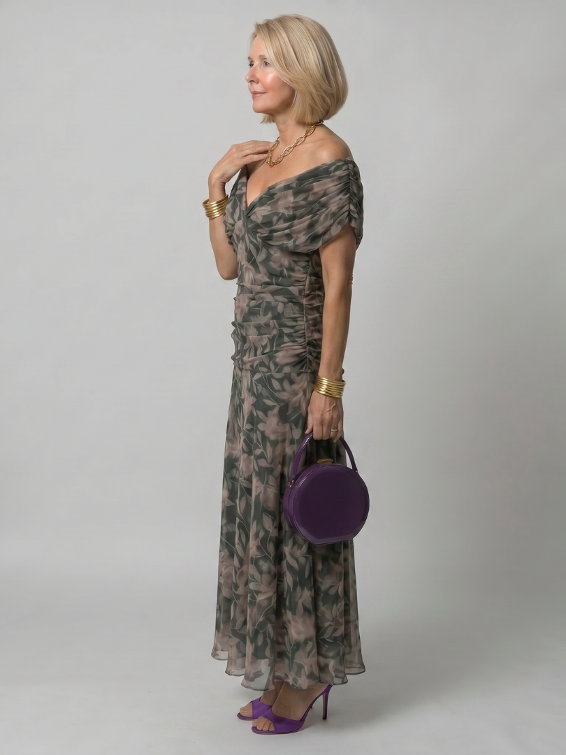 Purple off-shoulder midi dress with draped neckline and gently flared skirt