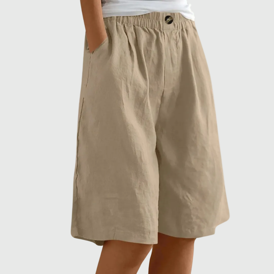 Women's casual leisure shorts in soft pink with an elasticated waist and relaxed fit