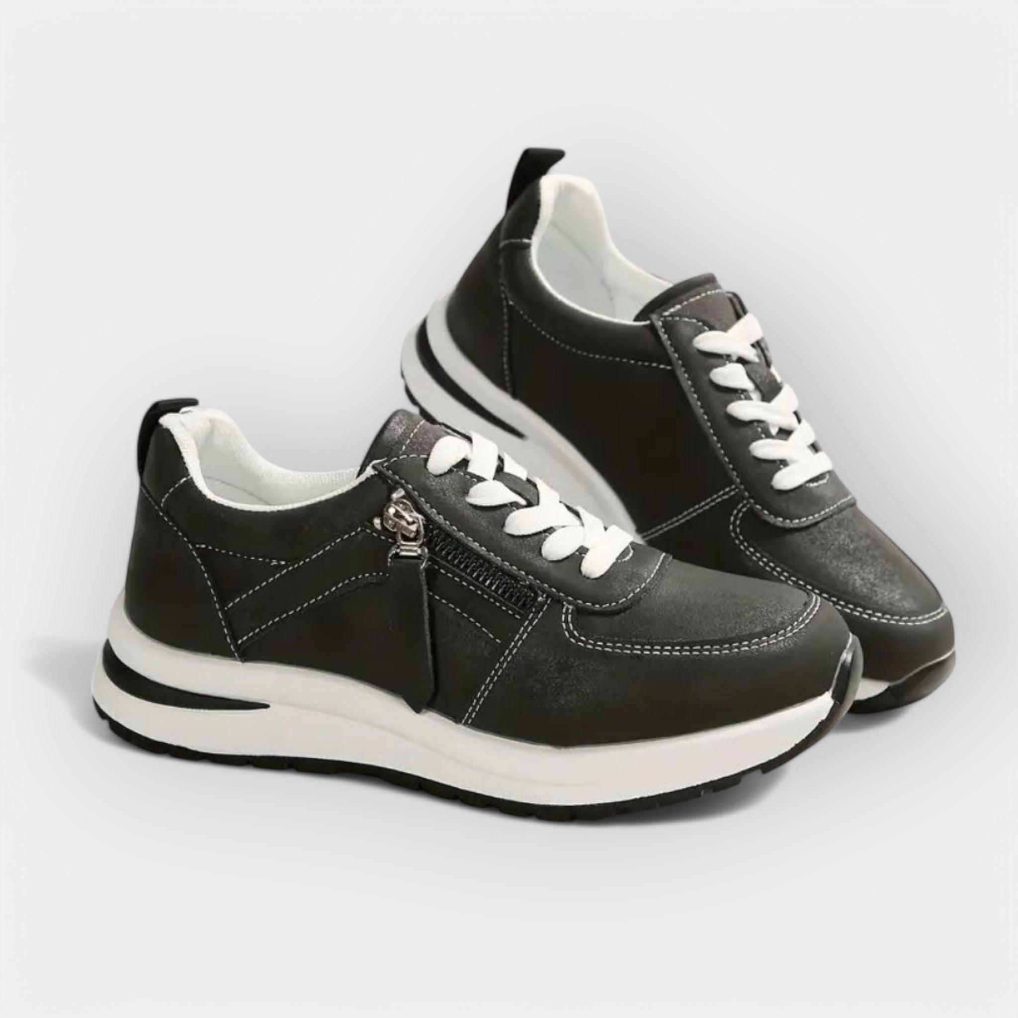 Women's elegant anatomic trainers in black with a supportive cushioned sole