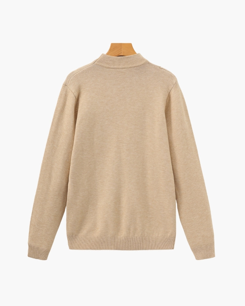 Men's black ribbed roll-neck jumper with a clean structured silhouette