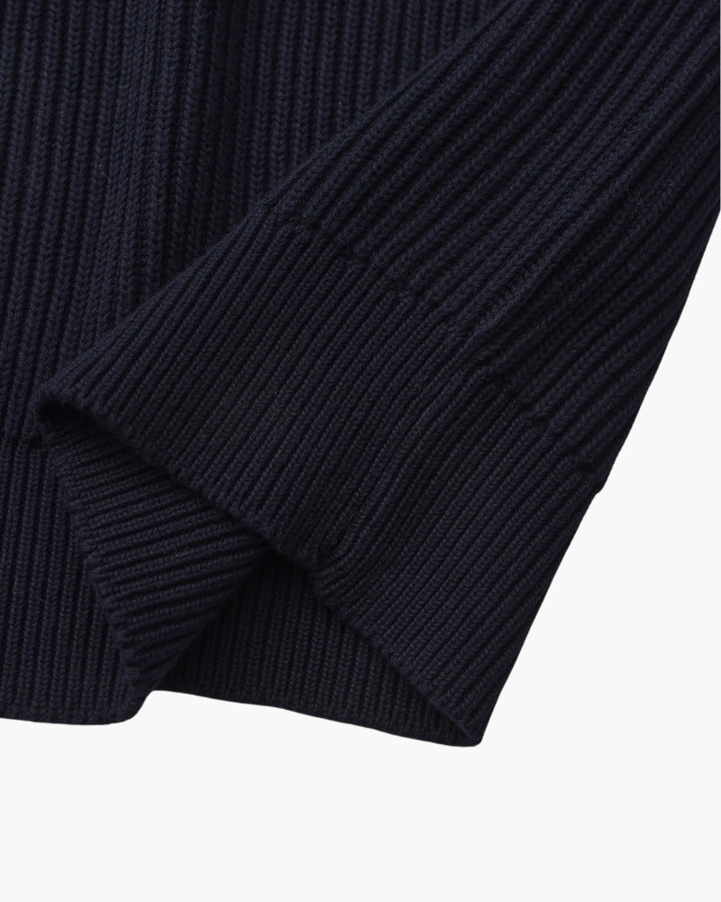 Men's black crew-neck ribbed jumper with a clean, classic silhouette