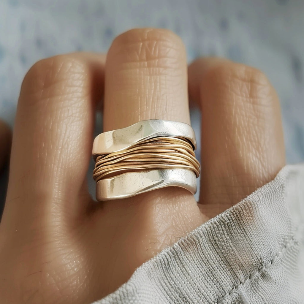 Two-tone minimalist ring with layered structure and smooth clean lines