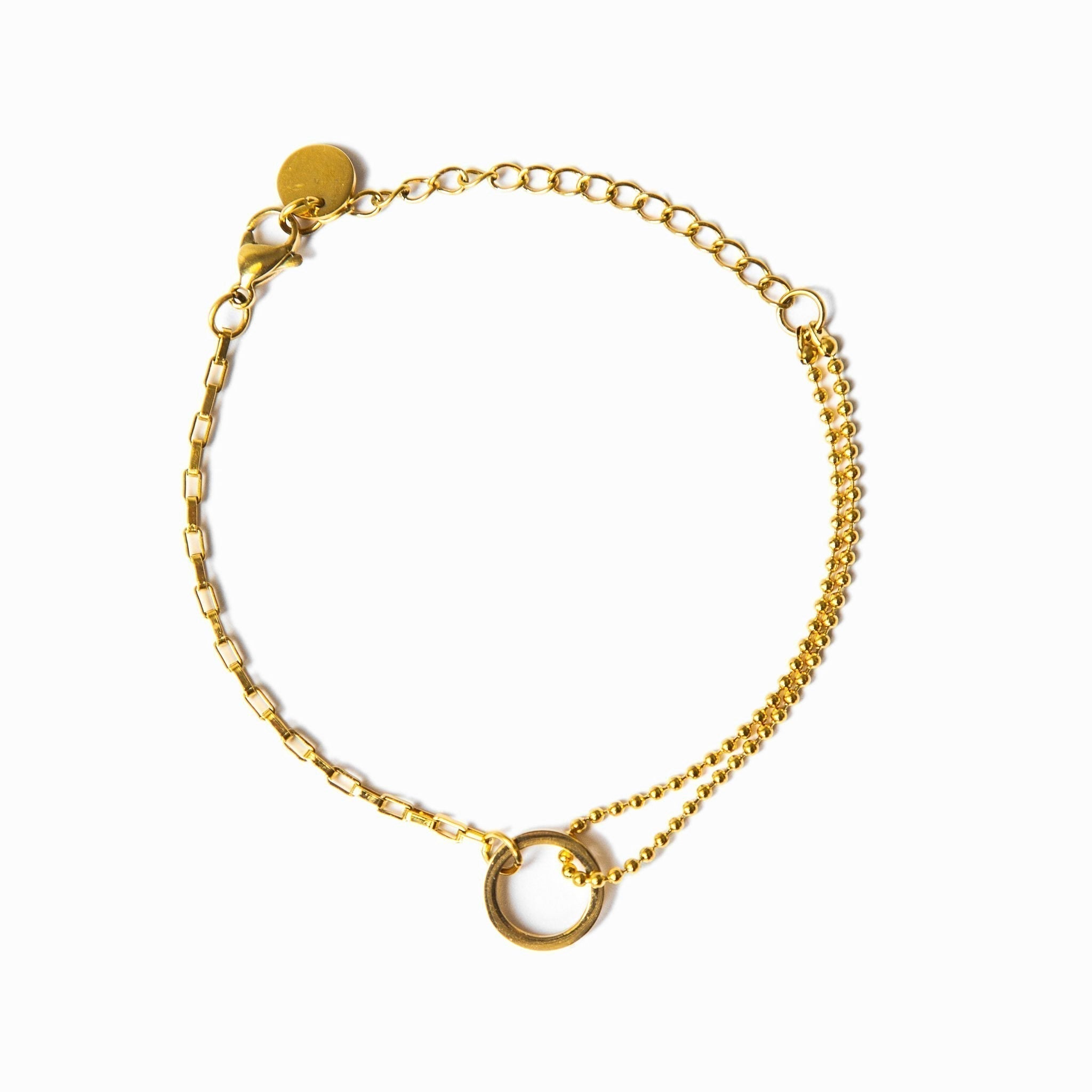 Elegant gold tennis bracelet with row of sparkling stones