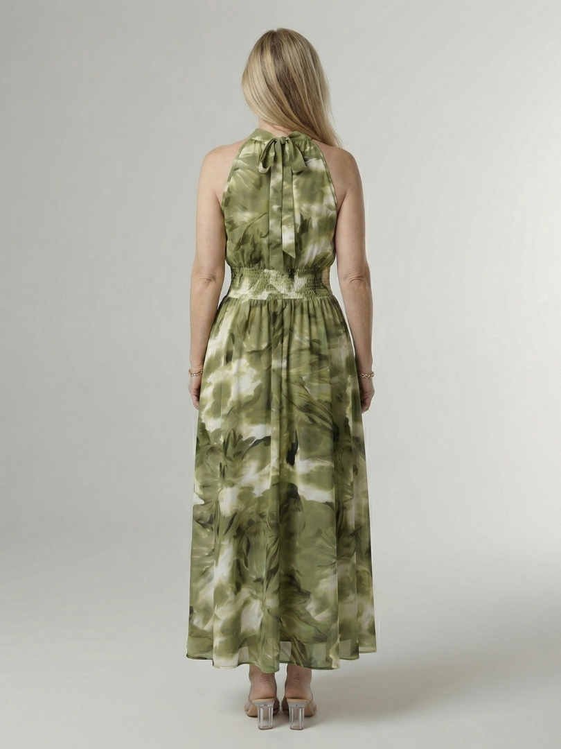 Yellow halter neck midi dress with a ruched waist detail in a clean, simple silhouette