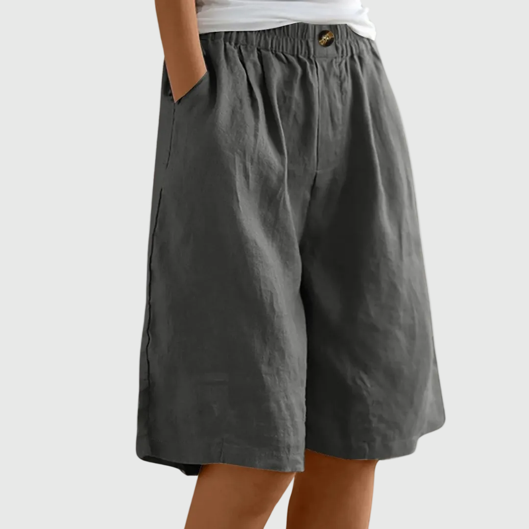 Women's casual leisure shorts in soft pink with an elasticated waist and relaxed fit