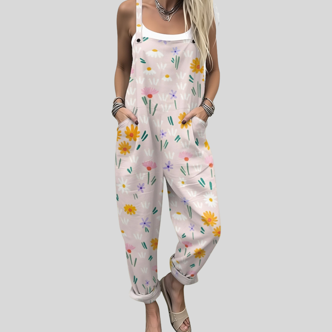 Women's wide-leg dungarees in soft pink with a cheerful scattered wildflower print in yellow, orange and lilac.