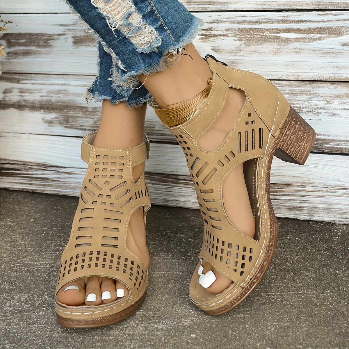 Navy block heel sandals with cutout detail and back fastening