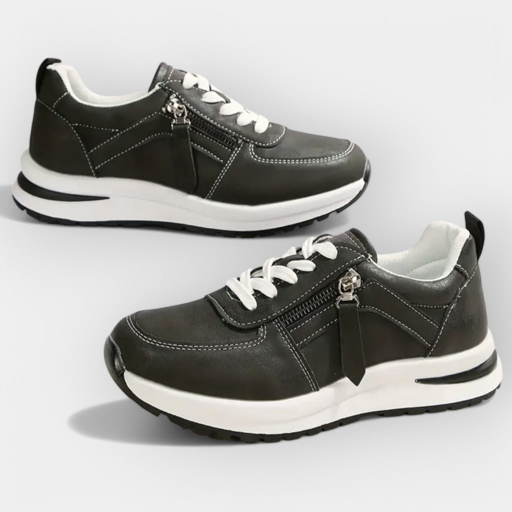 Women's elegant anatomic trainers in black with a supportive cushioned sole