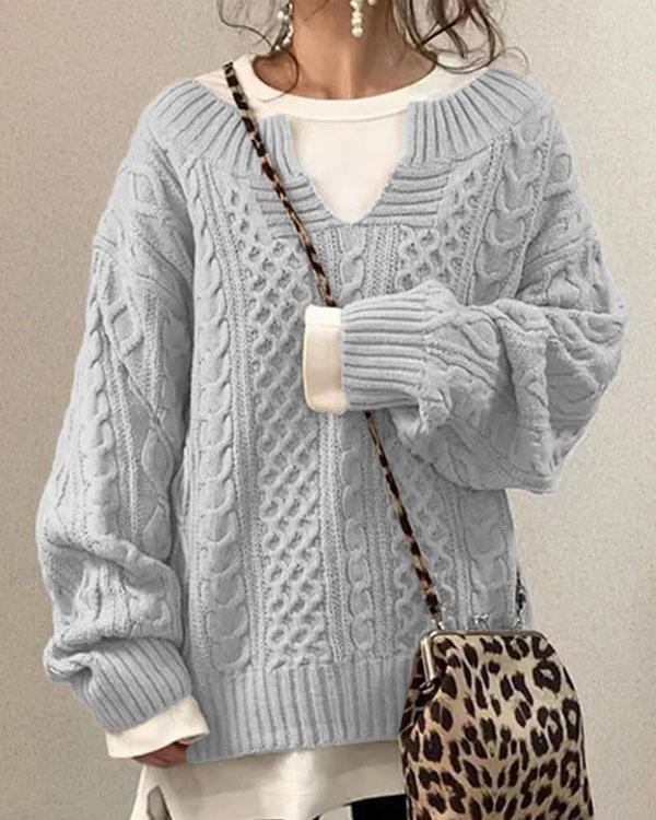Beige cable knit v-neck jumper with classic textured pattern and relaxed fit
