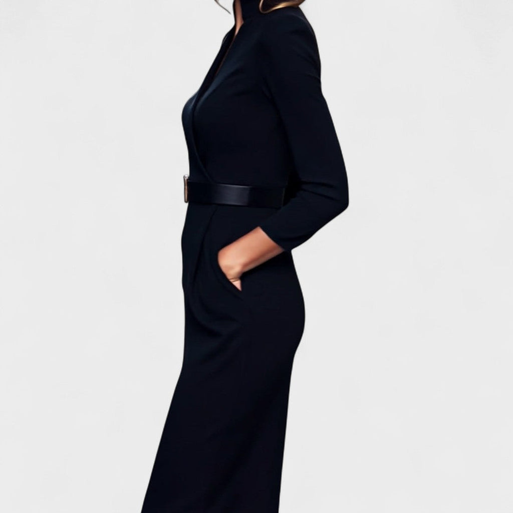 Elegant floaty dress in black with an adjustable tie waist and graceful fall