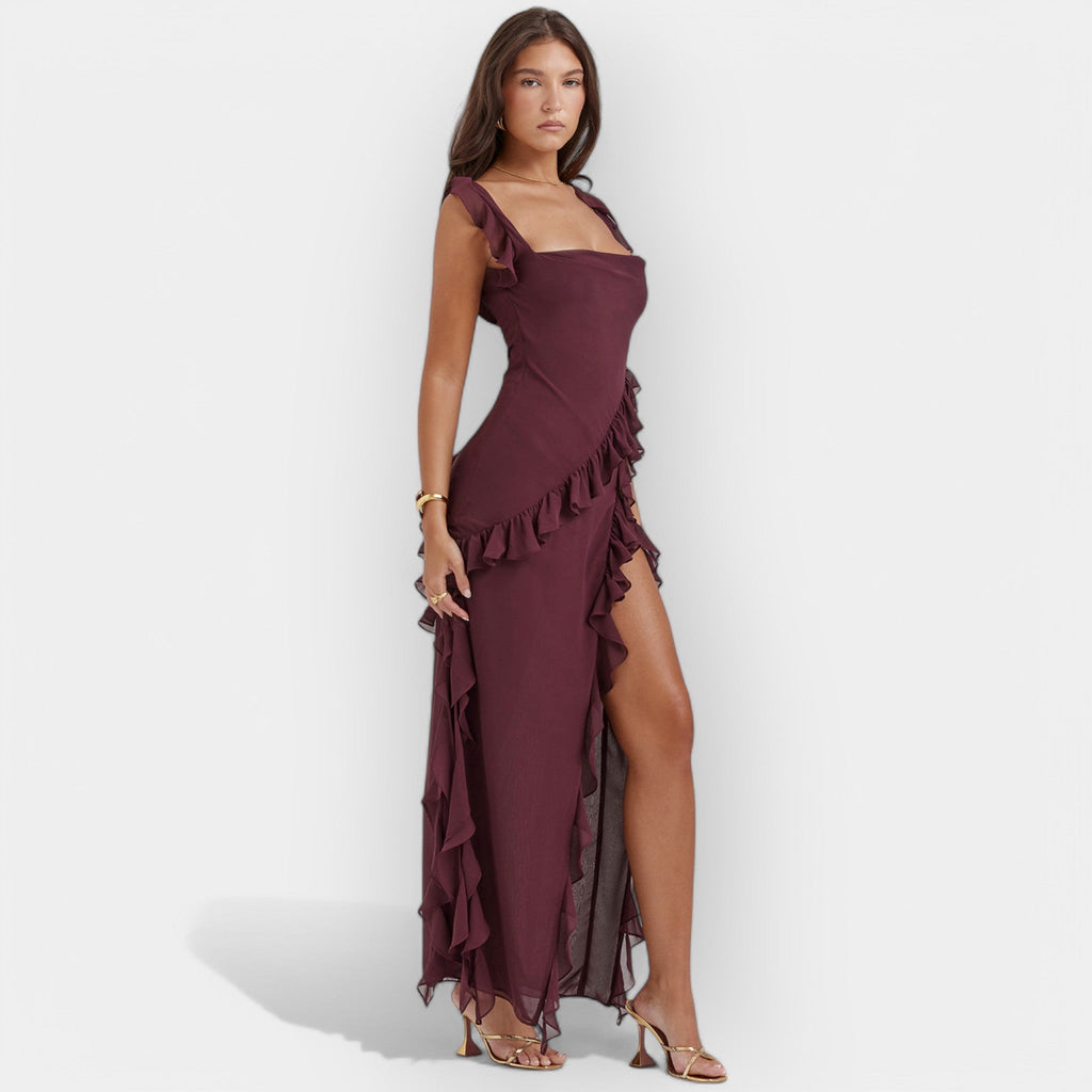 Women's floaty dress in burgundy with a thigh-level slit and delicate ruffle detail