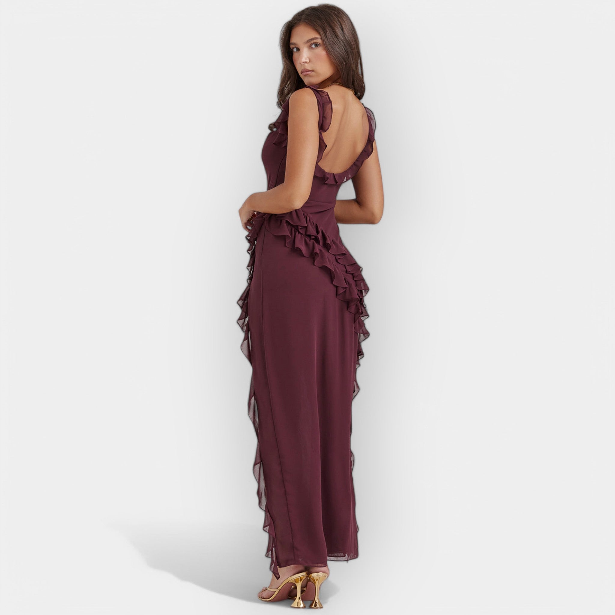 Women's floaty dress in burgundy with a thigh-level slit and delicate ruffle detail