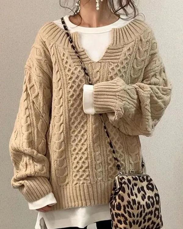 Beige cable knit v-neck jumper with classic textured pattern and relaxed fit