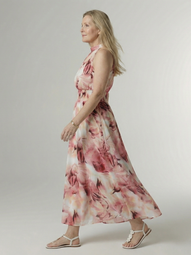 Yellow halter neck midi dress with a ruched waist detail in a clean, simple silhouette