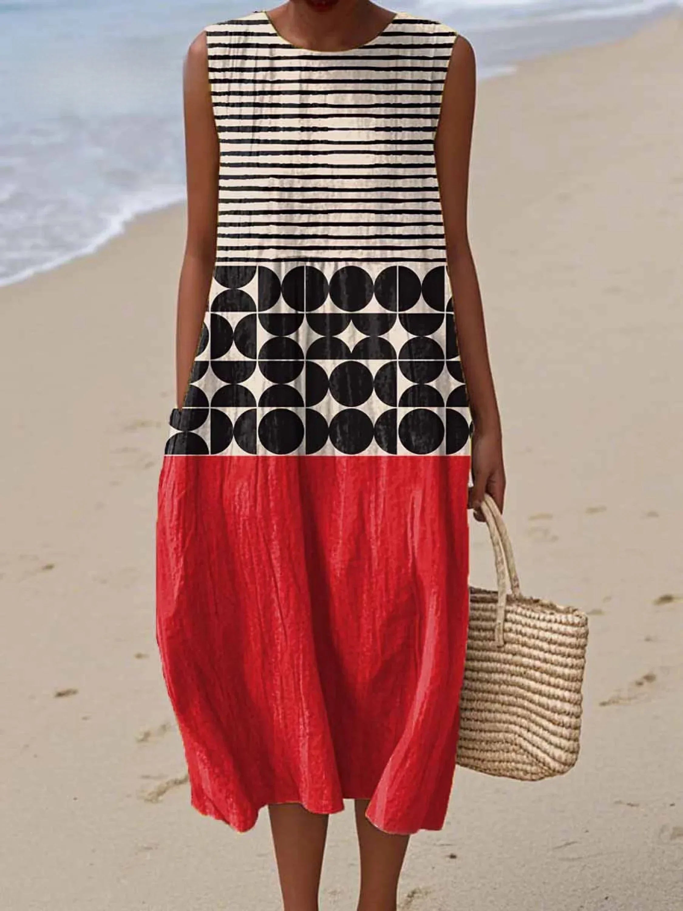 Sleeveless wrap dress with an abstract geometric print in warm summer tones