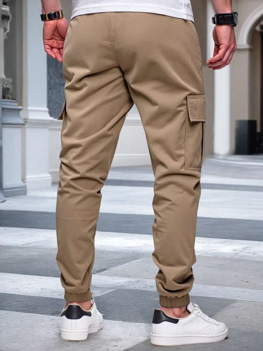 Men's modern urban cargo trousers in beige with cargo pockets and elasticated ankle cuffs