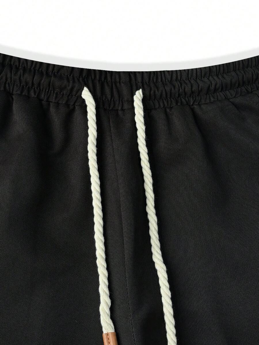 Men's modern urban cargo trousers in beige with cargo pockets and elasticated ankle cuffs