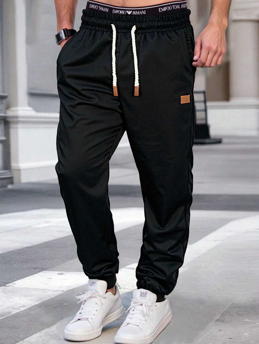 Men's modern urban cargo trousers in beige with cargo pockets and elasticated ankle cuffs