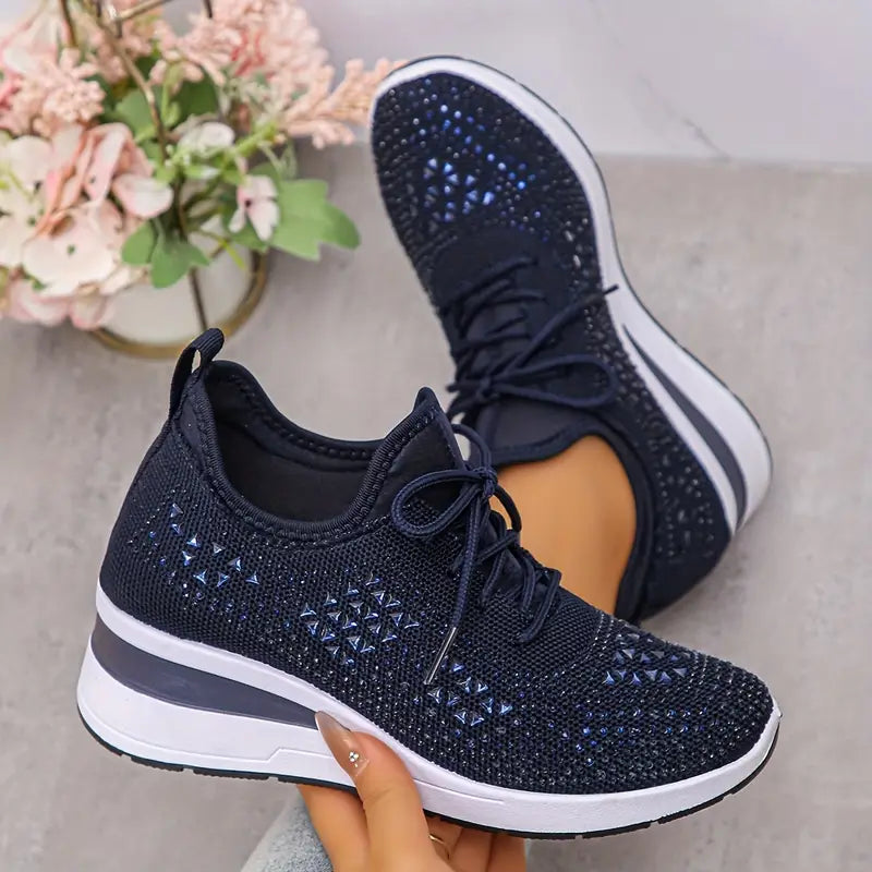 Women's supportive trainers in white with a cushioned sole and clean modern design