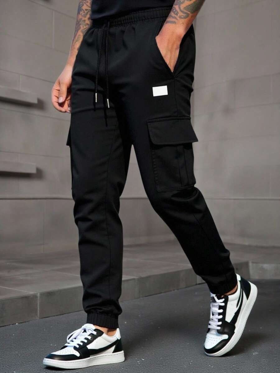 Men's modern urban cargo trousers in beige with cargo pockets and elasticated ankle cuffs