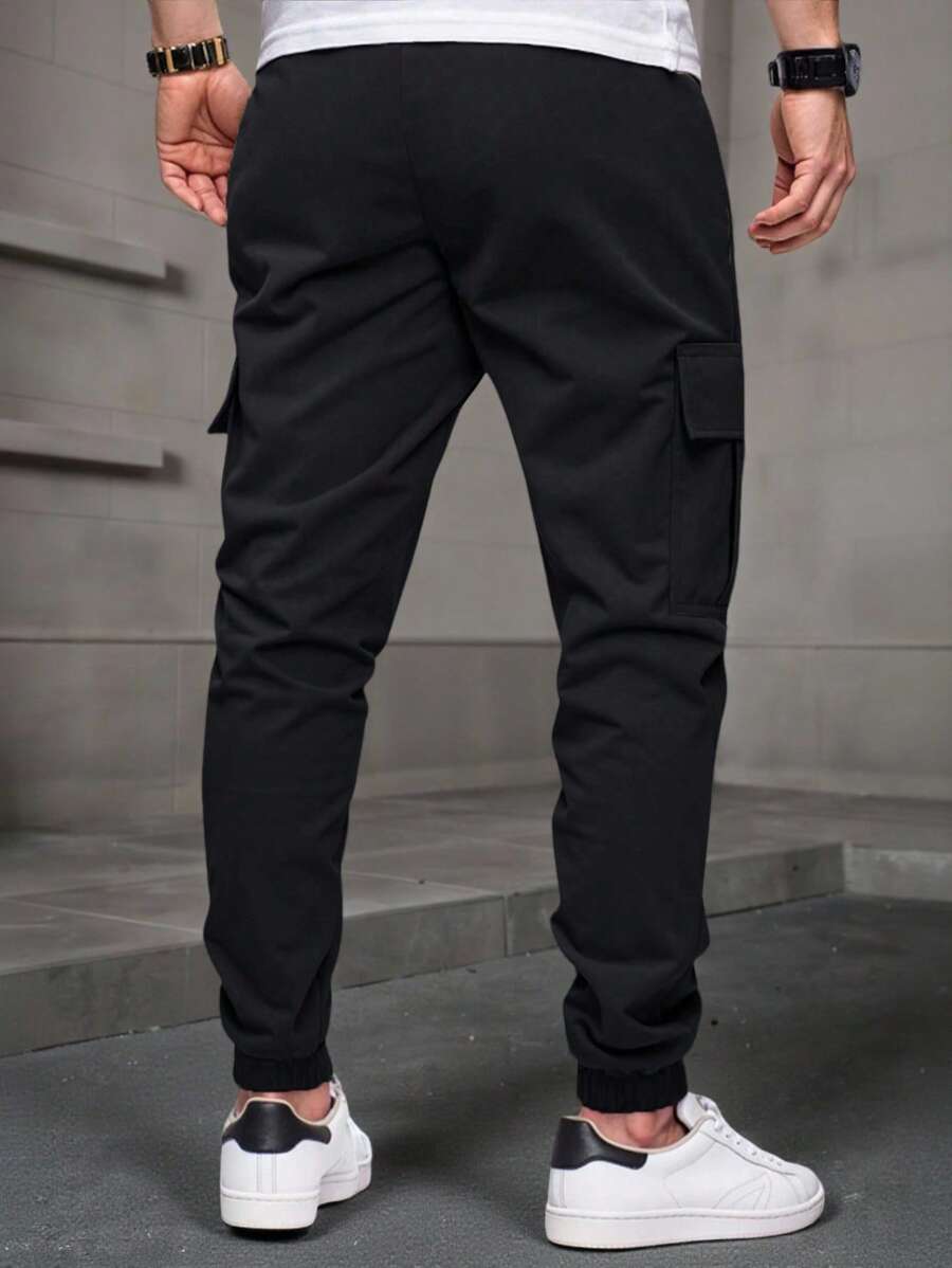 Men's modern urban cargo trousers in beige with cargo pockets and elasticated ankle cuffs
